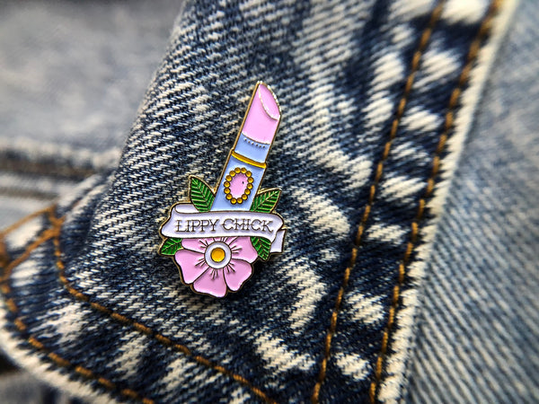 LIPPY CHICK Lipstick Tattoo Soft Enamel Pin. Pinned on denim jacket