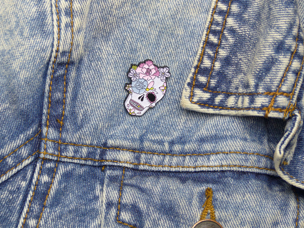 Peony & Rose Sugar Skull Tattoo Soft Enamel Pin on a denim jacket